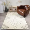Image de tapis salon 120x170 fait à la main en laine beige motif traditionnel