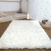 Image de Tapis longs poils shaggy 60x110 rectangle fait à la main crème motif uni