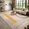 Image de tapis salon 160x230 tissé beige et jaune rectangle motif abstrait CONTETRE