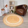 Image de Tapis rond Ø200cm fait main en jute motif uni pour grand salon SUNNY L