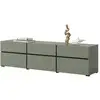 Image de Meuble tv coloris vert sauge 180cm collection havana. Meuble design avec 3 portes et 3 tiroirs.