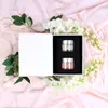 Image de Coffret de 2 bougies parfumées dans des pots de maquillage
