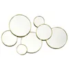 Image de Miroir - Home Deco Factory - Doré - Rond - Asymétrique