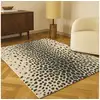 Image de Bobochic tapis poils ras meryl motif léopard imprimé léopard noir 120x170 MERYL