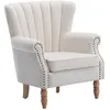 Image de Fauteuil en tissu crème finition cloutée BATOUMI