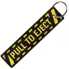 Image de CLJ - Porte-clés - PULL TO EJECT - Noir et jaune - Sécurité aviation - Urgence