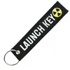 Image de CLJ - Porte-clés - NUCLEAR LAUNCH KEY - DANS LA POCHE DE VLADIMIR - Noir et blanc - Sécurité aviation - Urgence