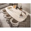 Image de Amara - table à manger - plateau effet travertin - 4 à 8 personnes - Bois / Beige