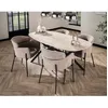 Image de Ruben - table à manger - plateau en céramique effet travertin - pieds en acier - 4 à 6 personnes - Beige / Noir