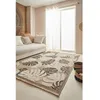 Image de Tapis intérieur extérieur aspect jute aux motifs feuilles - NAZAR RUGS - 120x170 cm - Nature - Noir
