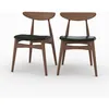 Image de Lot de 2 chaises en cuir synthétique noir et bois dhévéa - Josette - Maison Pavane