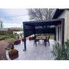 Image de Pergola bioclimatique ALUMINIUM HABRITA - Surface de protection 1080 m² - Rideaux manuels gris anthracite
