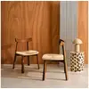 Image de Lot de 2 chaises scandinaves en bois d'hévéa effet noyer et assise en corde beige