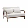 Image de Banquette à bouclettes . Pieds bois d'hévéa teinté noyer clair. 2 places droit fixe. Pieds compas scandinave
