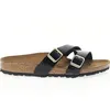 Image de Sandales plates - Birkenstock - YAO - Noir - Boucle de serrage - Semelle en caoutchouc