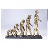 Image de Statuette - KARE - EVOLUTION - Couleur dorée - 42.5x58x18.5 cm - Polyresine