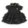 Image de Petite Robe Noire vêtement pour poupée Ma 36cm