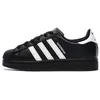 Image de Baskets Noires Garçon/Fille Adidas Superstar