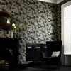 Image de JULIEN MACDONALD Papier peint support intissé Honolulu vinyle - 1005 x 52 cm - Noir et or