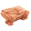 Image de Plaid déco à pompons polyes 130x170cm vieux rose