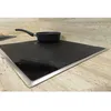 Image de Protecteur de table induction - NOSTIK - 48 x 58 cm - Découpable - Résistant 260°C - Maille antiadhésive conductrice