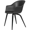 Image de GUBI chaise avec accoudoirs BAT DINING CHAIR avec la base en hêtre noir (Black - Polypropylène et bois)