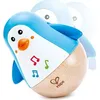 Image de Hape Jouet D'éveil Musical En Bois - Pingouin Culbuto Musical