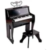 Image de Grand piano droit avec apprentissage interactif noir