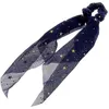 Image de La Boutique du Coiffeur - Chouchou foulard étoilé bleu marine