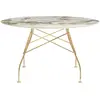 Image de KARTELL table ronde GLOSSY MARBLE Ø 128 cm (Symphonie - Grès finition Marbre et acier doré)
