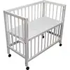Image de Lit bébé à barreaux cododo en hêtre massif blanc 40x90 cm 100022