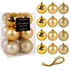 Image de Boules de Noël incassables - VILDE - Lot de 12 - 6 cm de diamètre - Dorées - Finition brillante pailletée et mate