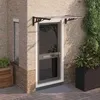 Image de vidaXL Auvent de porte Noir et transparent 122x90 cm Polycarbonate 153683