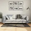 Image de vidaXL Tapis lavable noir et doré 80x150 cm 136615