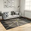 Image de vidaXL Tapis lavable noir et doré 160x230 cm antidérapant 136618