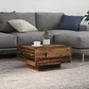 Image de Table basse avec lumières LED en bois vieilli 55x55x31 cm