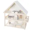 Image de ROBA Maison de poupée, avec meubles et poupées inclus.
