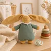 Image de Peluche musicale lapin nid d'ange Sauge (25 cm)