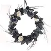 Image de Couronne halloween fleurs et mini crânes 40 cm FETE-22984