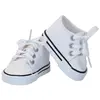 Image de Baskets blanches pour poupée 36 cm PetitCollin-603620