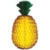 Image de Grand Ananas en papier de soie alvéolé jaune 36cm FETE-PFTDAN