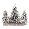 Image de Centre de table en bois avec 3 Sapins enneigés réalistes et 20 leds 27x32cm C-12778