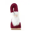 Image de Centre de table Père Noël bordeaux velours avec barbe 22,5cm sur socle C-12897