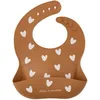 Image de Bavoir en silicone Coeurs Caramel