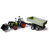 Image de Tracteur Claas avec fourche et remorque