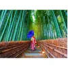 Image de Puzzle 1000 PiÃ¨ces : Femme asiatique dans une forÃªt de bambous