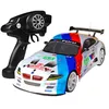 Image de Voiture radio commandée 1:10 70 km/h 4WD double batterie phare LED camion course - blanc