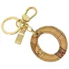 Image de Alviero Martini, Femmes, Porte-clés, Porte-clés Prima Classe beige en polyéthylène, Beige
