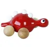 Image de Jouet à promener en bois : dino rouge Vilac