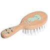 Image de Brosse à cheveux en bois pour poupée